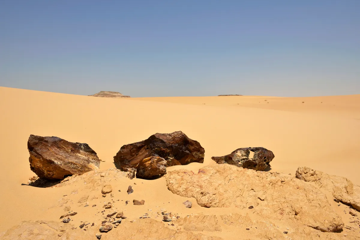 Scientists can learn a lot by studying meteorites that fall to Earth. Credit: Enrico Cantore / Getty Images