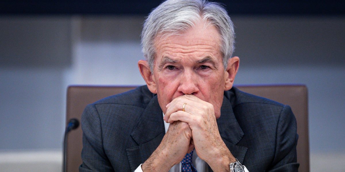 Powell cuts rates in the dark in historic move, with no jobs data and Trump heckling from abroad