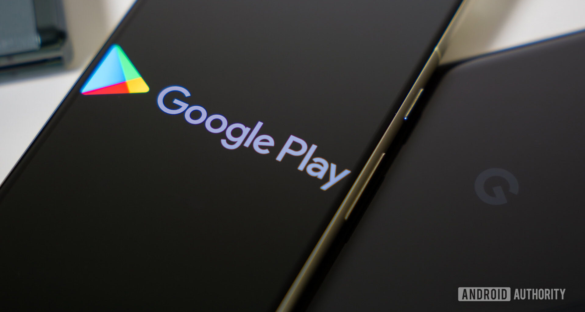 Google Play Store logo on smartphone stock photo (3)