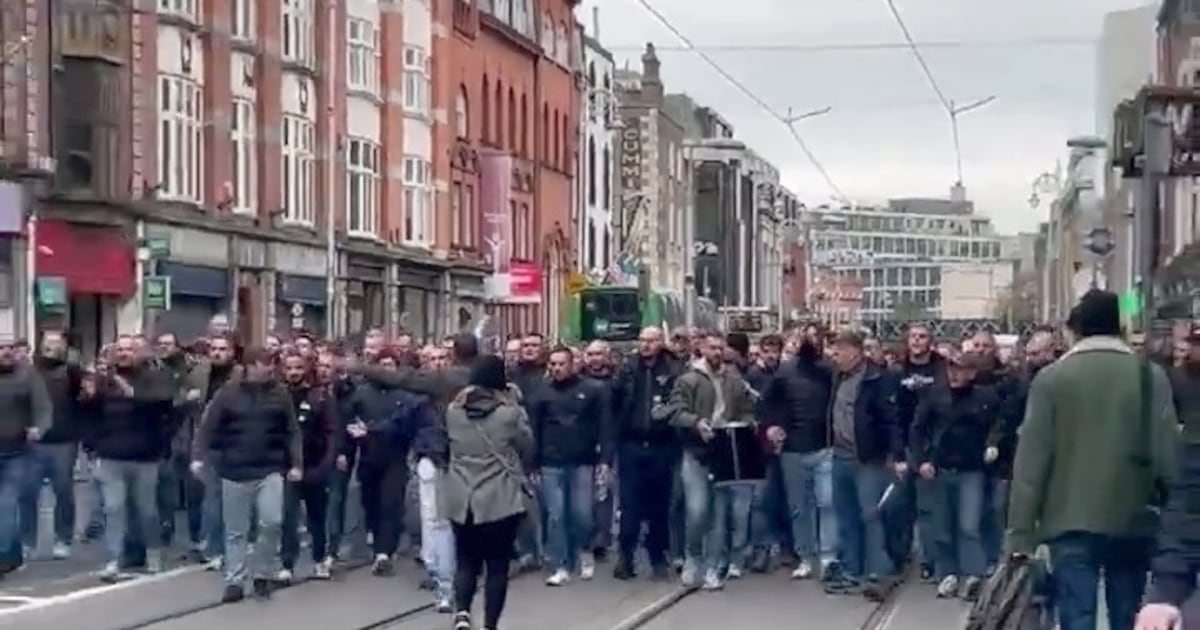 Photographer describes ‘horrific’ Dublin attack by German soccer supporters – The Irish Times