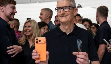 Apple shares hit record high amid iPhone demand boost