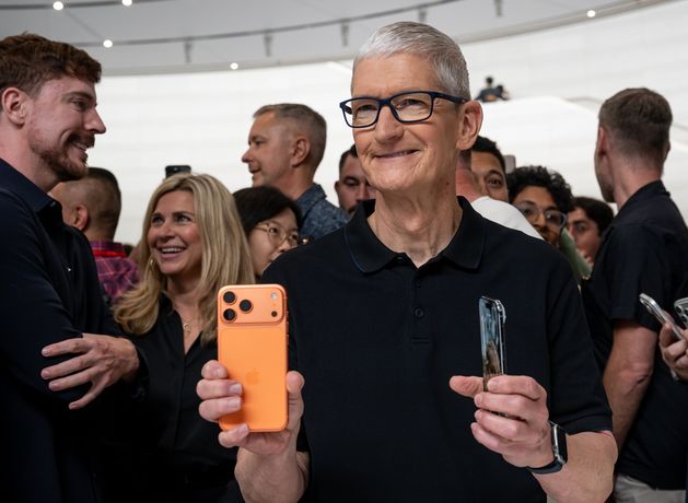 Apple shares hit record high amid iPhone demand boost