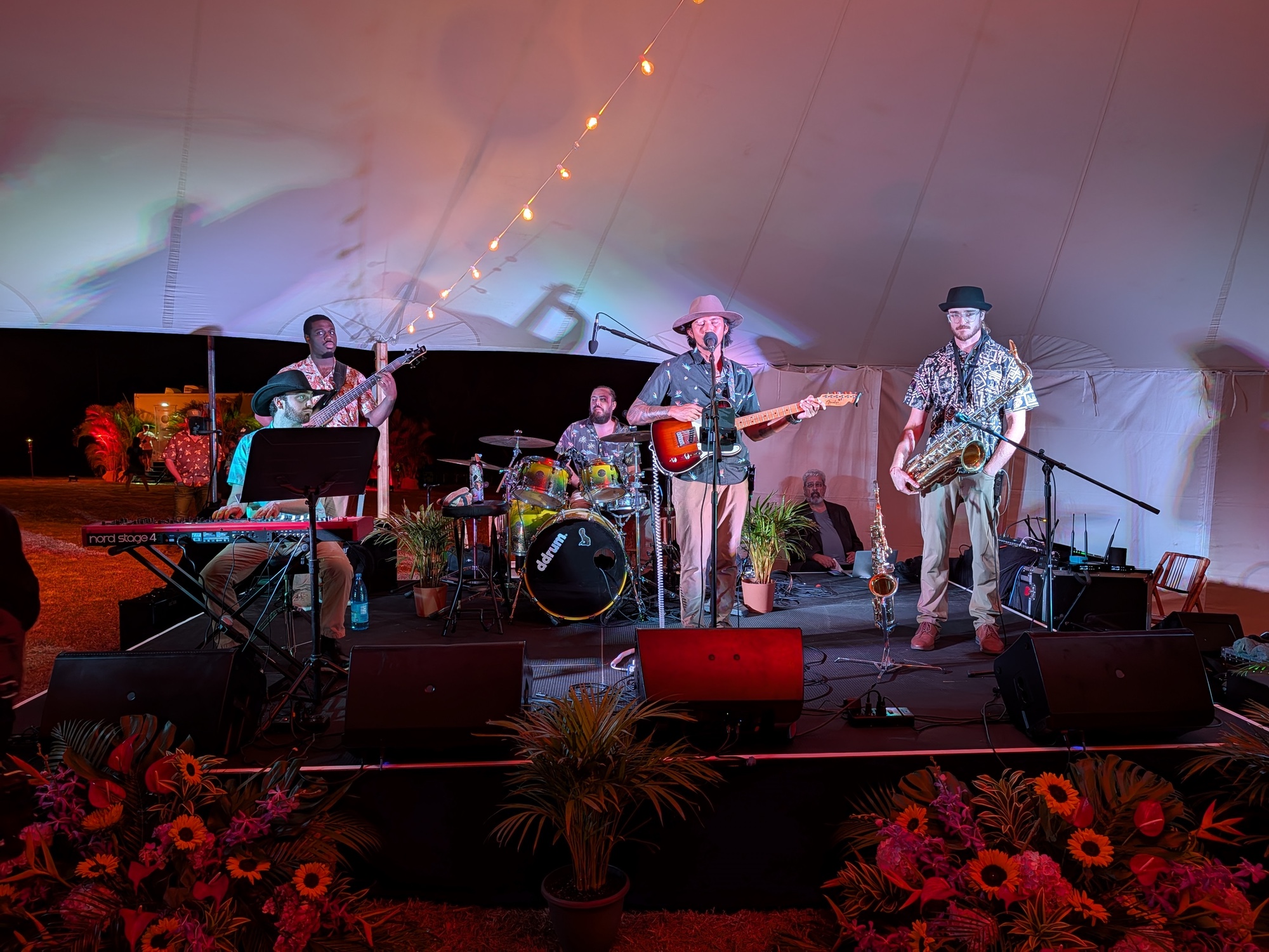 band playing at night by Pixel 10 Pro