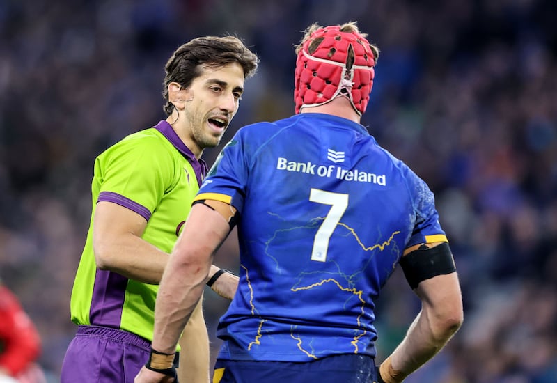 Italian referee Gianluca Gnecchi speaks to Leinster's Josh van der Flier during the Leinster v Munster game at Croke Park last Saturday. Photograph: Dan Sheridan/Inpho