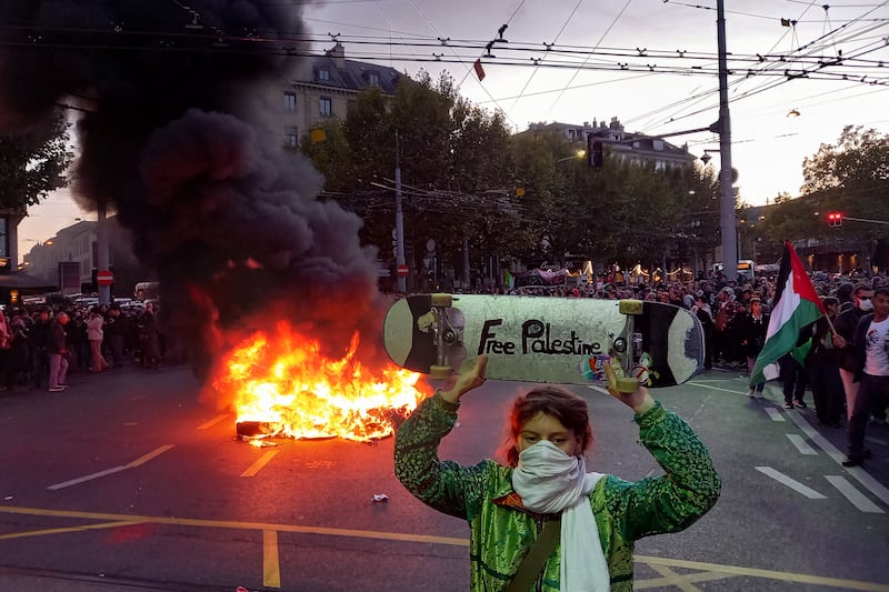 Switzerland: A demonstrator in Geneva at a rally to protest over the interception of the Global Sumud Flotilla on Thursday. Photograph:  Robin Millard/AFP 