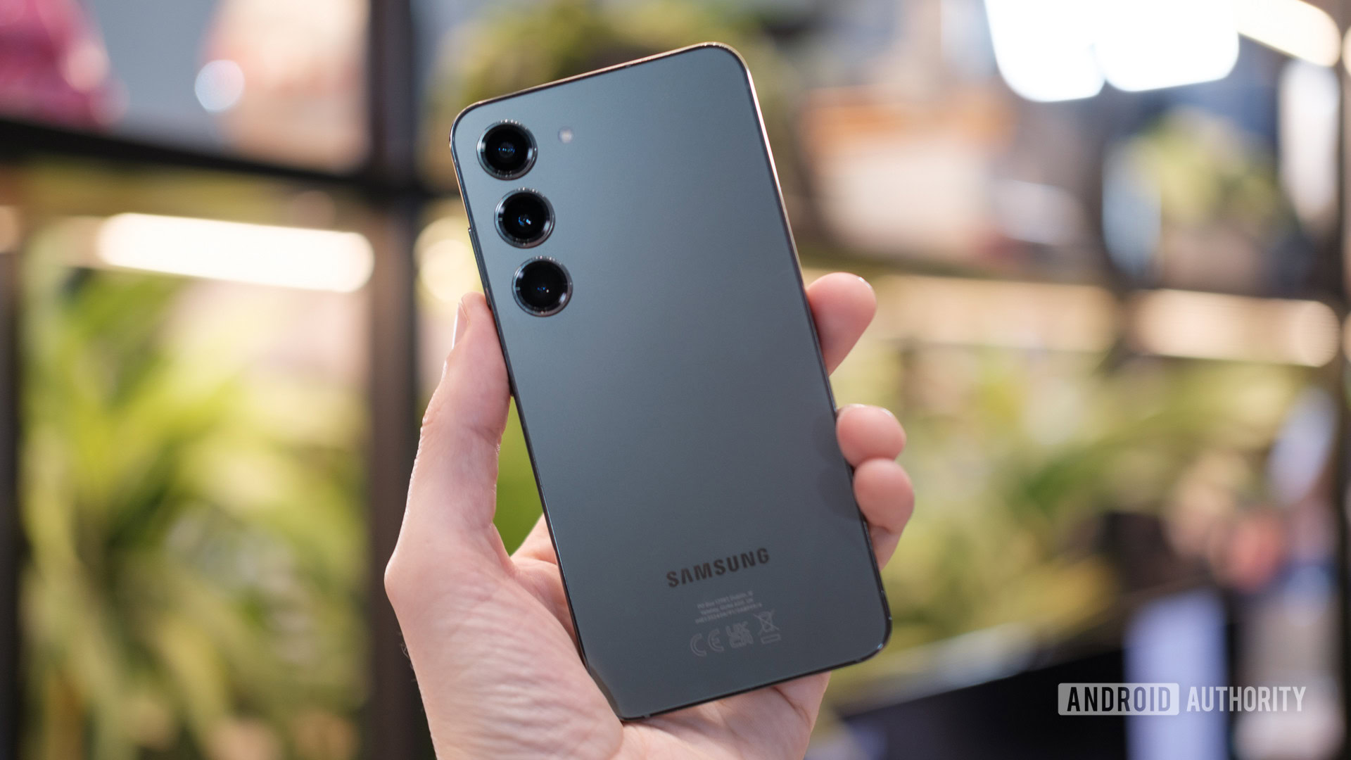 Samsung Galaxy S23 back green colorway in hand Samsung Galaxy S23 back green colorway in hand