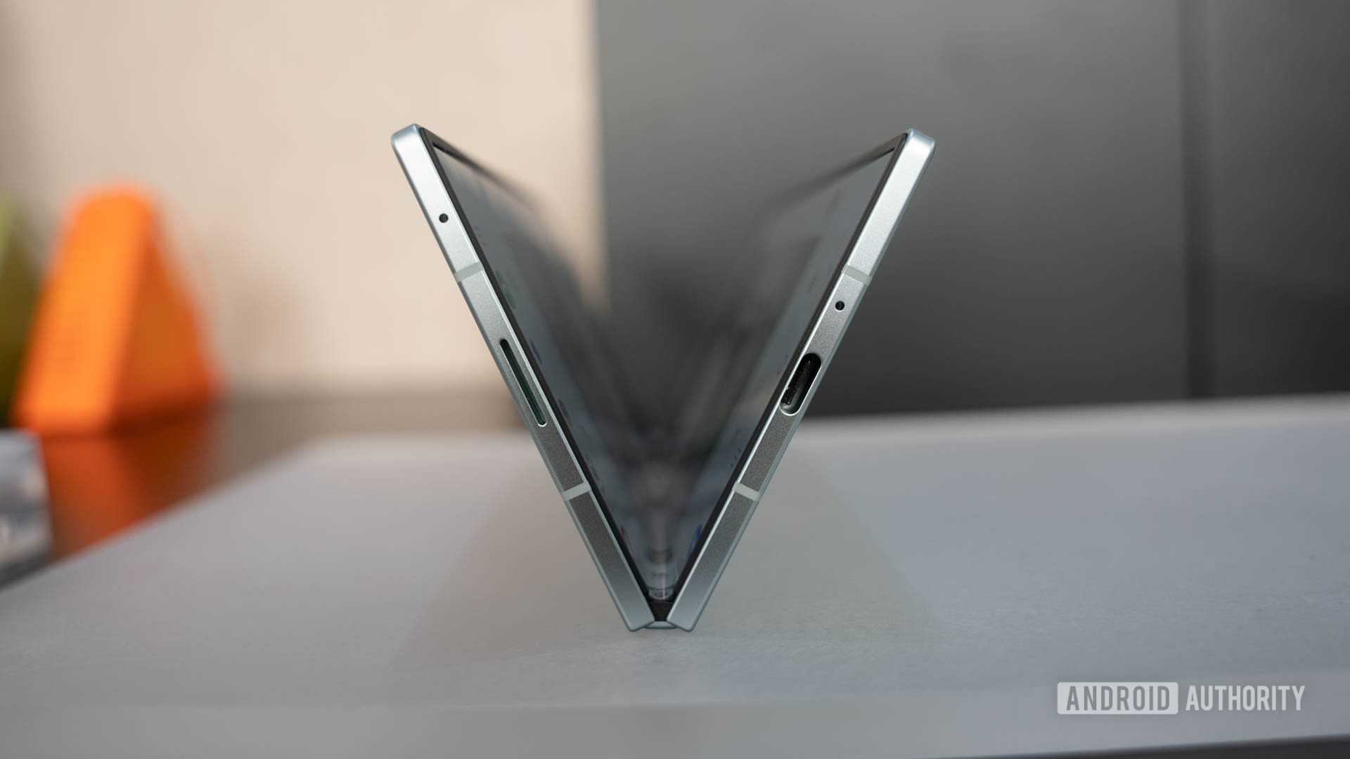 Samsung Galaxy Z Fold 7 in Mint standing on table in a V formation Samsung Galaxy Z Fold 7 in Mint standing on table in a V formation