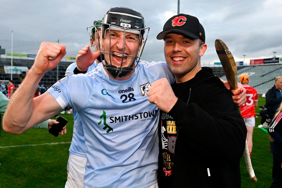 Na Piarsaigh's Conor Boylan celebrates with a supporter after the Limerick SHC final victory over Doon. Photo: Brendan Moran/Sportsfile