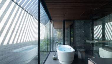 Stealth Is a Home Hidden Behind a Monolithic Facade in Tokyo
