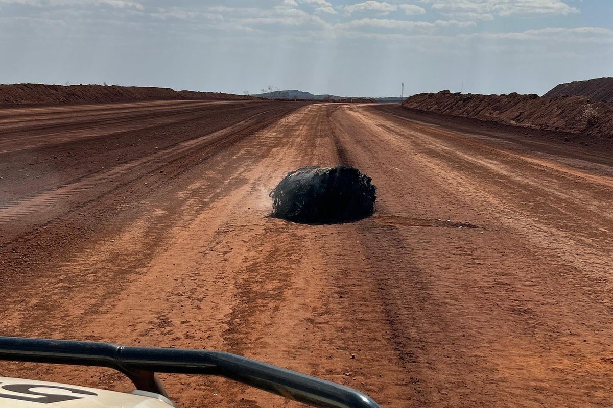 Mystery of smouldering debris found in outback resolved - The Independent