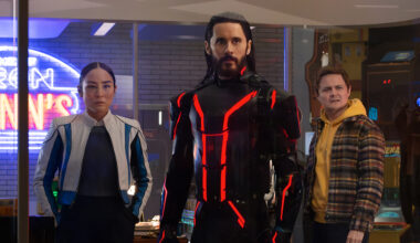 (L-R) Greta Lee as Eve Kim, Jared Leto as Ares, and Arturo Castro as Seth Flores in Tron: Ares