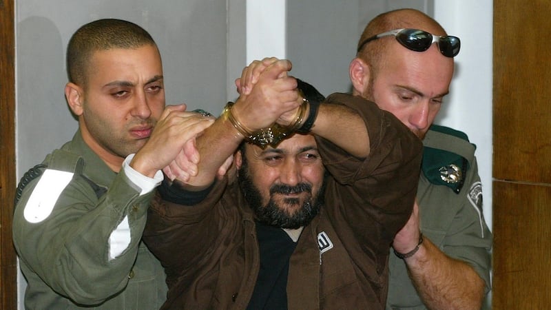 Marwan Barghouti being ushered into court in  2003 in Tel Aviv, Israel. Photograph: David Silverman/Getty Images
