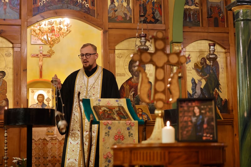 Fr Serhii Danilov leads a Panikhida memorial service in Dublin for Vadym Davydenko. Photograph: Alan Betson