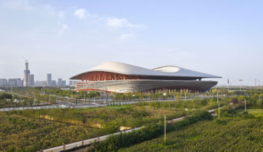 A Football Stadium With Fluid Forms Rises Above in China