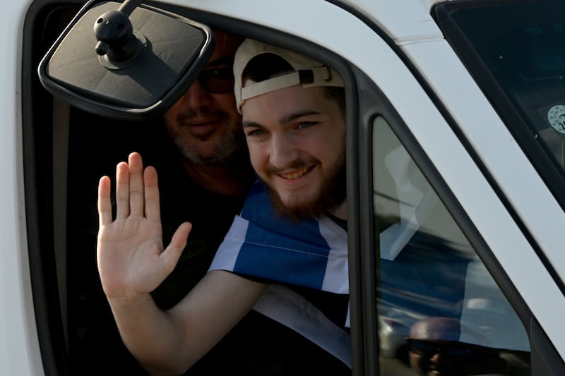 Released Israeli hostage Bar Kupershtein waves to well-wishers. Photograph: Alexi J Rosenfeld/Getty Images