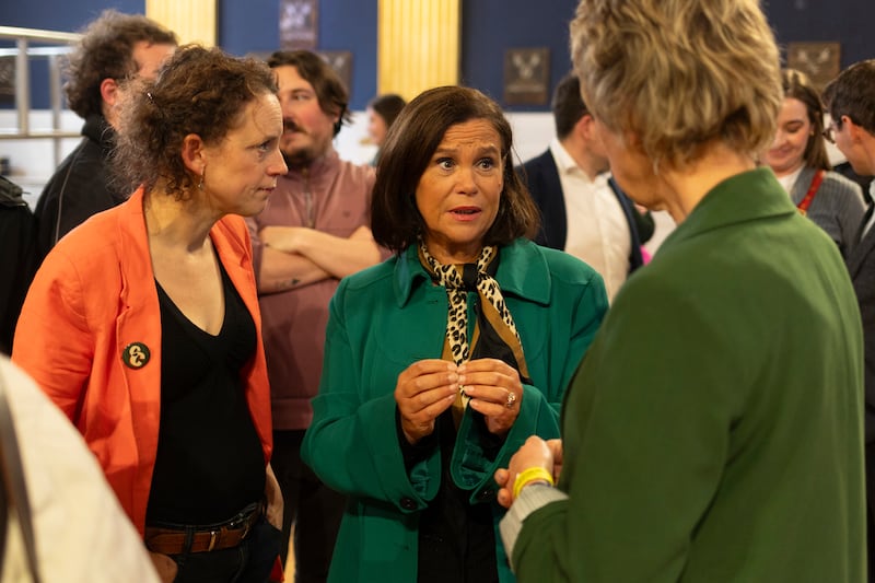 Marie Sherlock TD, Sinn Féin leader Mary Lou McDonald, and Labour leader Ivana Bacik chat in Dublin Castle as the presidential votes are tallied ahead of Catherine Connolly’s victory announcement. Photograph: Chris Maddaloni/The Irish Times