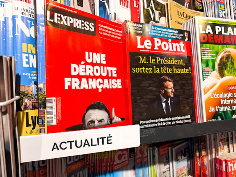 The cover of Le Point with the title 'Mr President, come out with your head held high', next to the cover of L Express with the title, "A French Rout". Photograph: Nicolas Guyonnet / Hans Lucas/AFP/Getty Images          