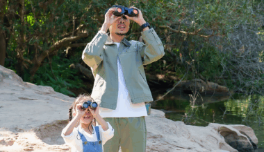 father and daughter bird watching