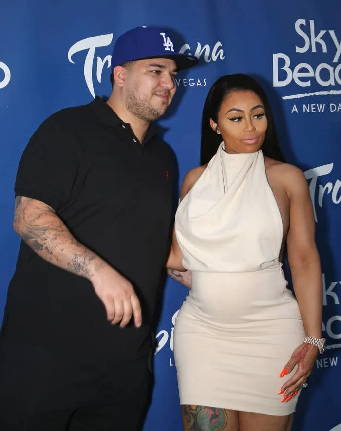 Rob Kardashian and Angela White at an event