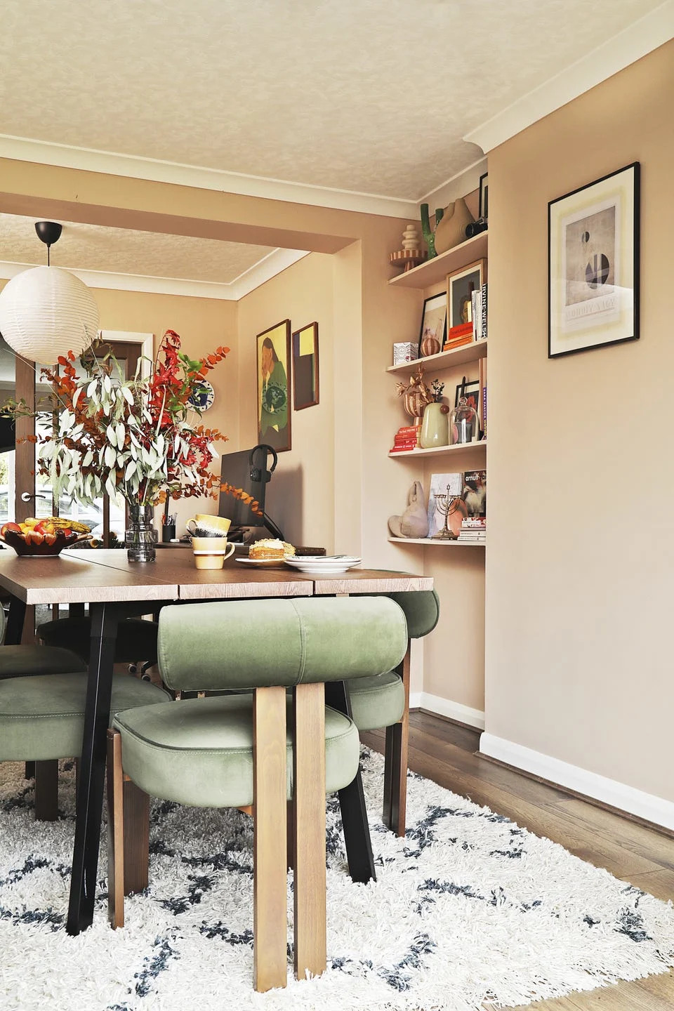rectangular dining table and green fabric chairs