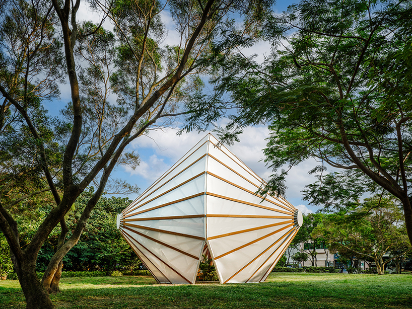 three angular canopies echo traditional oil-paper umbrellas in cheng tsung feng's installation