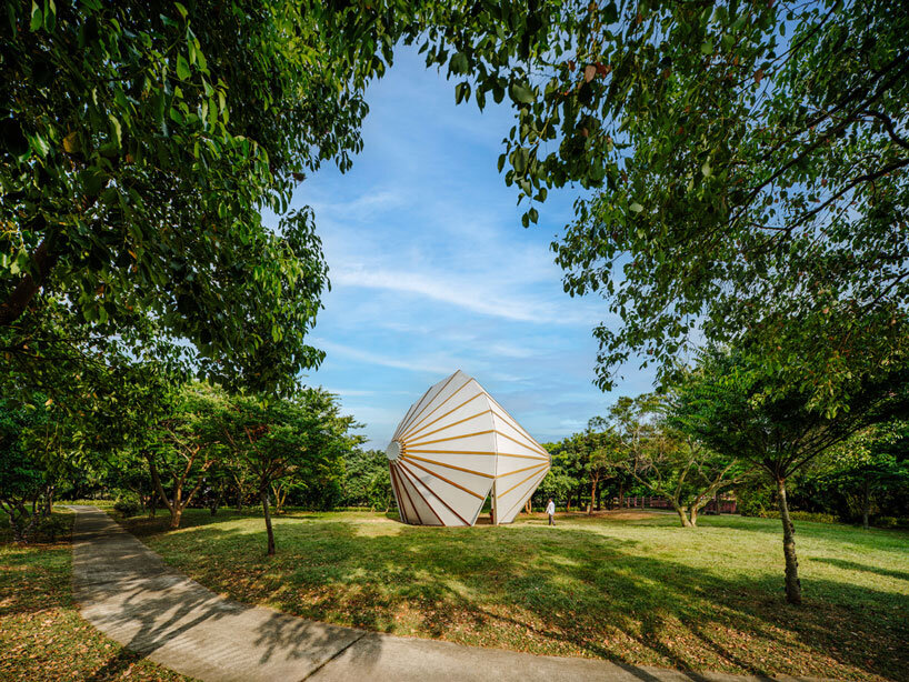 three angular canopies echo traditional oil-paper umbrellas in cheng tsung feng's installation