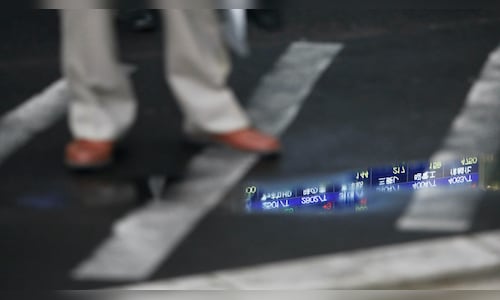 Asian markets dip tracking Wall Street; Gold prices fall below $4,000