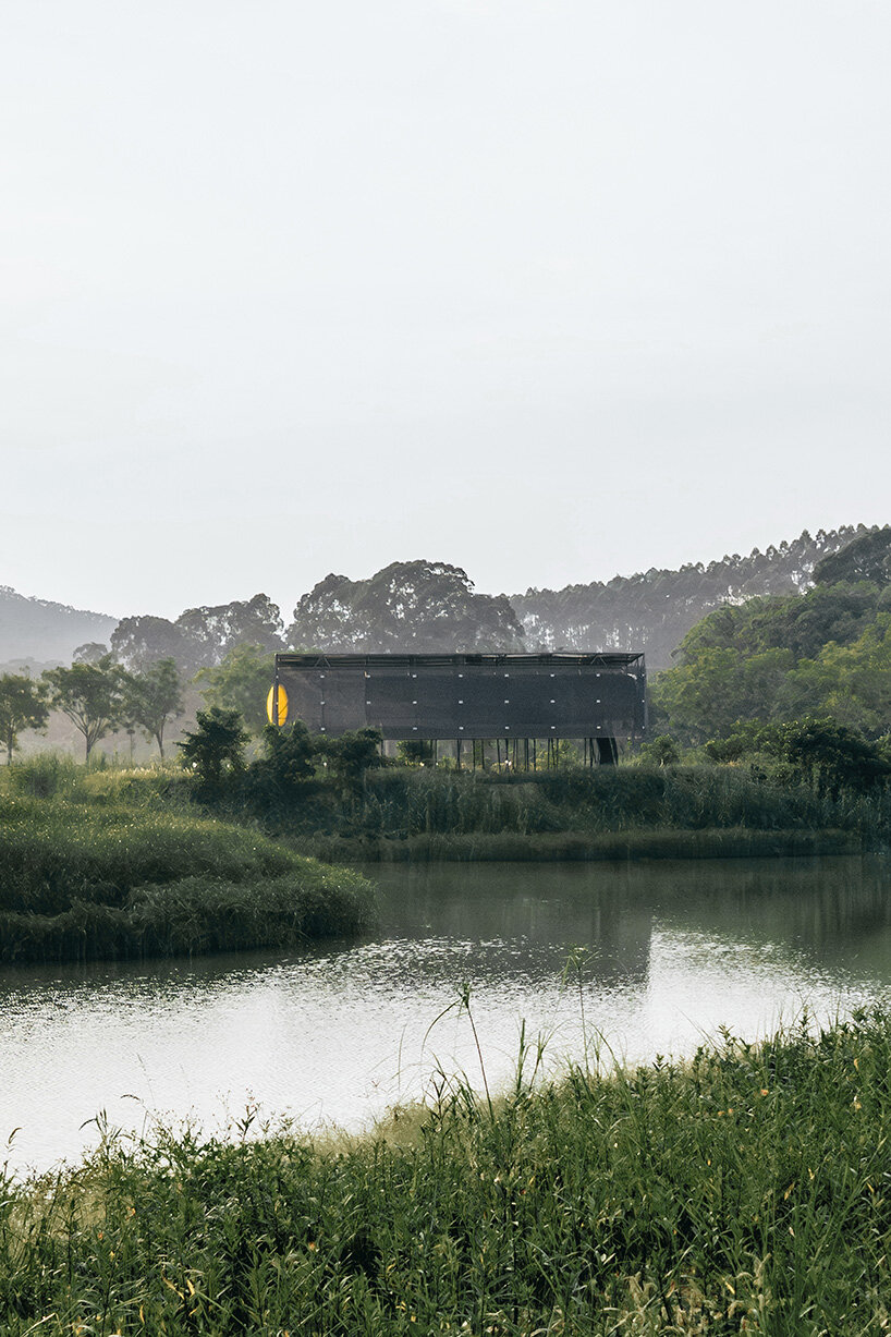 atelier guo's moonlit pavilion rises from the remains of an abandoned greenhouse in china