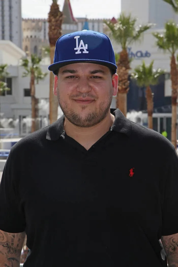 Rob Kardashian standing outdoors