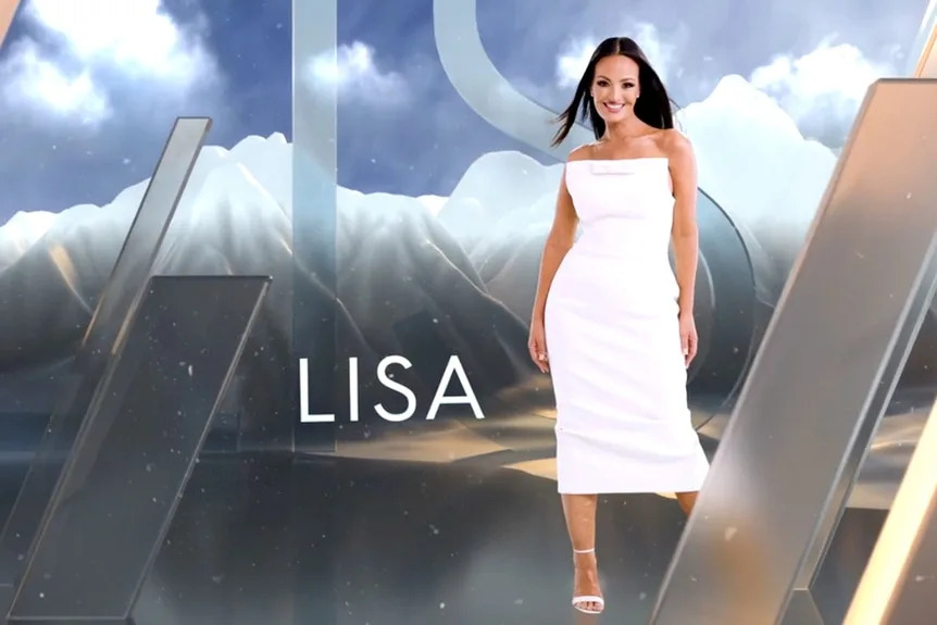 Lisa Barlow wearing a white dress in front of a mountain and cloud graphic