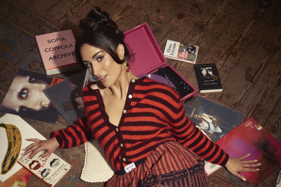 Podcaster and content creator Jenny Claffey wears cardigan, €175, American Vintage, arnotts.ie. Skirt, €275, Ríon Hannora, omdivaboutique.com. Photo: Evan Doherty