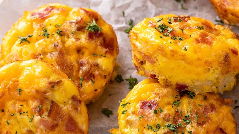Breakfast egg muffins or egg bites with potato, bacon and cheddar