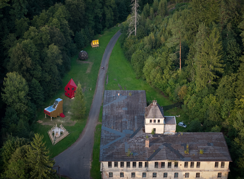from chicken-like shelters to spiky wooden huts, hello wood's cabin fever lands in czechia