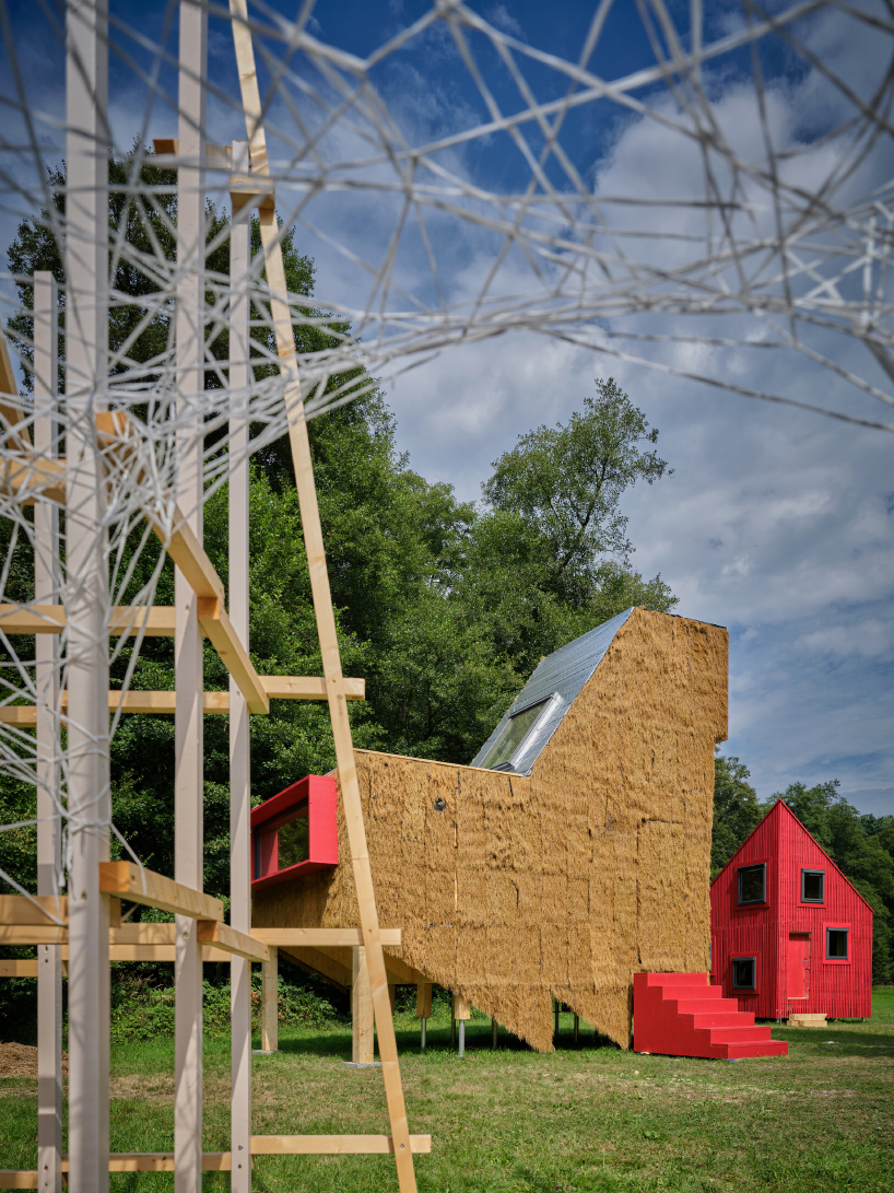 from chicken-like shelters to spiky wooden huts, hello wood's cabin fever lands in czechia