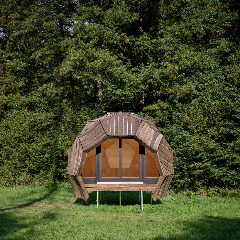 from chicken-like shelters to spiky wooden huts, hello wood's cabin fever lands in czechia