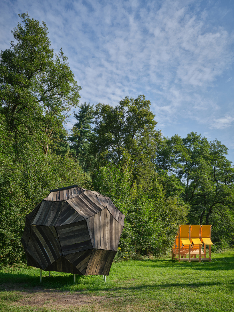 from chicken-like shelters to spiky wooden huts, hello wood's cabin fever lands in czechia