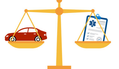 A vector illustration of a balance scale with a red car in the right pan and a document on a clipboard representing health insurance in the right pan.