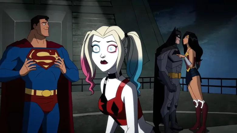 Kaley Cuoco's Harley Quinn standing in front of Superman, Batman, and Wonder Woman in Harley Quinn