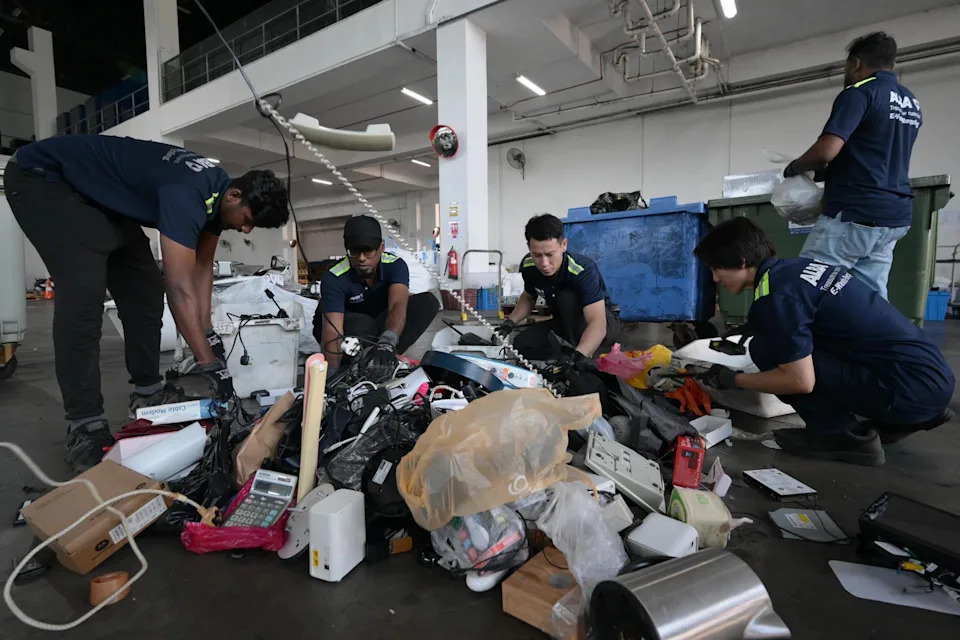 Collected e-waste is sorted at Alba E-Waste Smart Recycling's warehouse in Tuas.