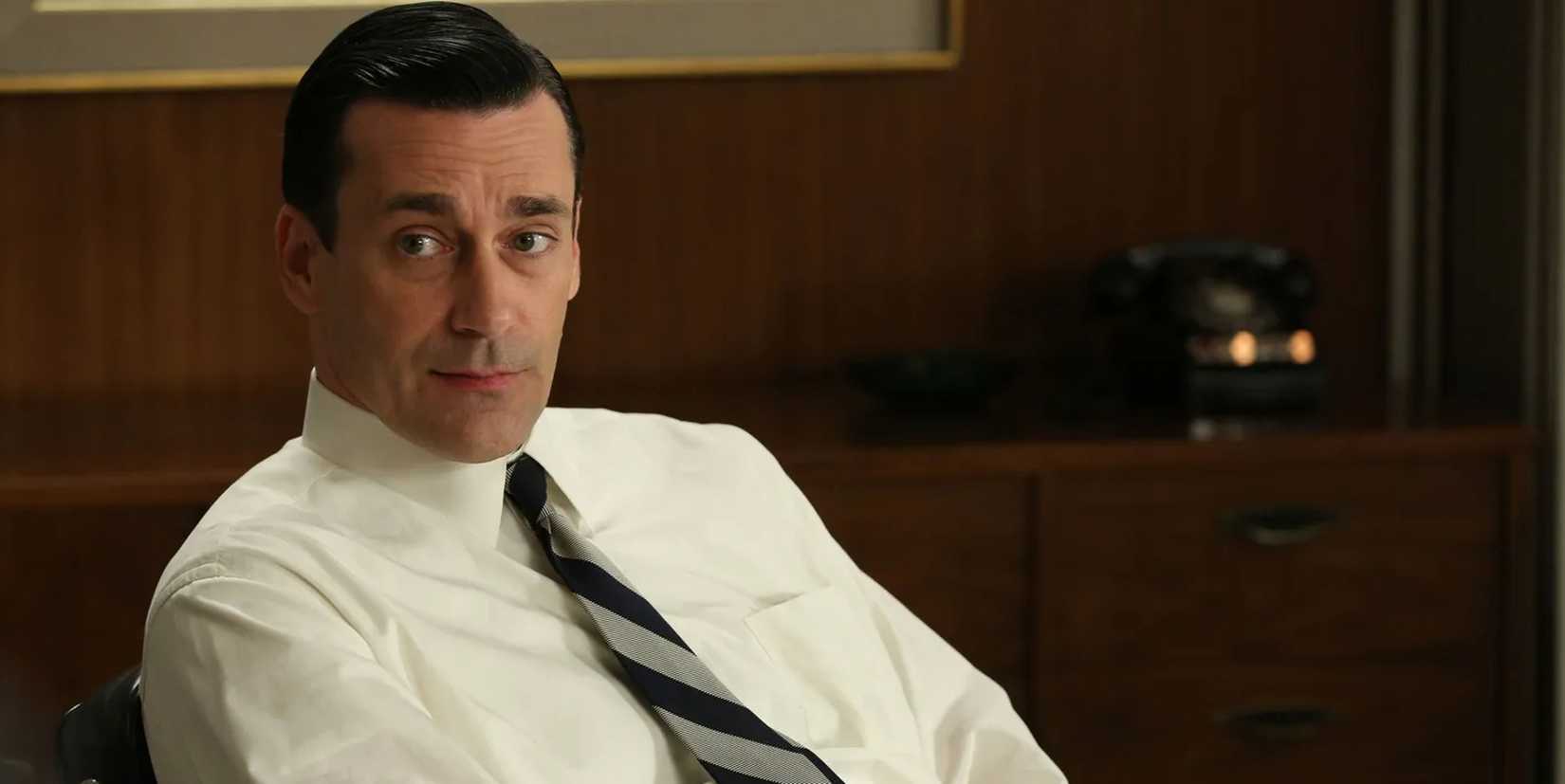 Don Draper sitting quizzical on Mad Men