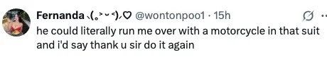 Tweet expressing admiration for someone in a suit, humorously suggesting they'd be thankful for even a negative interaction