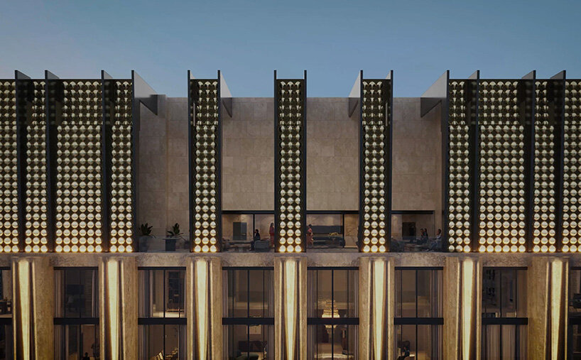 why and how fashion's biggest names expand into architecture and real estate