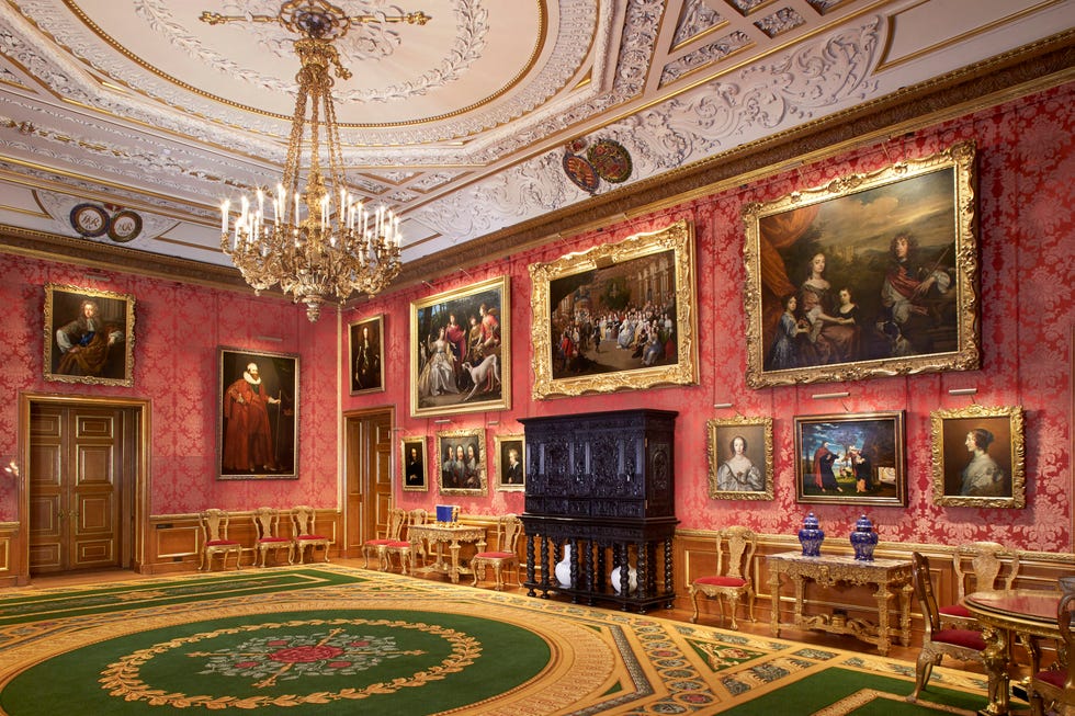 Luxurious room featuring ornate decor and classical artwork.