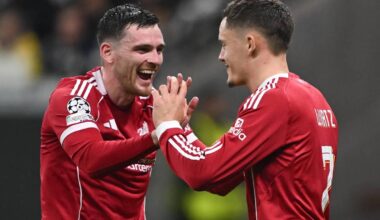 Liverpool’s Andy Robertson, left, celebrates with Florian Wirtz (DPA via Pa Wire)