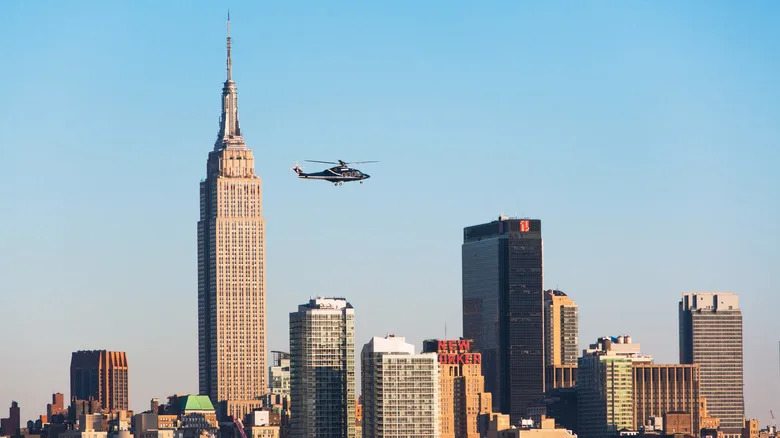 A helicopter flying over Manhattan