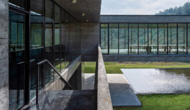 floating concrete structure by moguang studio anchors guesthouse complex in china