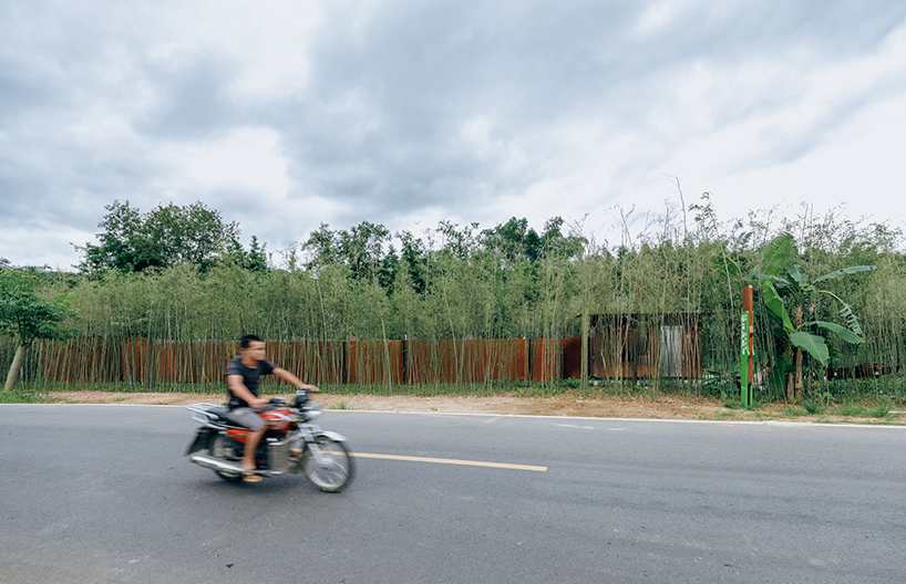 rhythmic steel pavilion by DL atelier weaves through riverfront bamboo grove in china