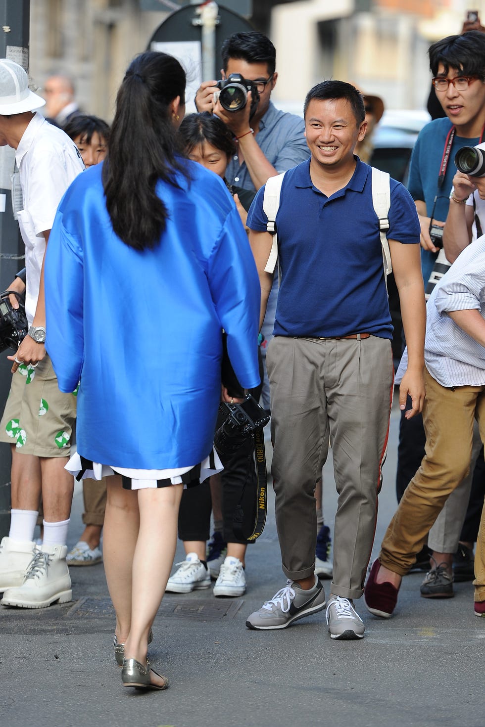 milan, italy june 23: caroline isse and tommy ton arrive at prada fashion show during during milan fashion week menswear spring/summer 2013 on june 23, 2013 in milan, italy. (photo by jacopo raule/getty images)