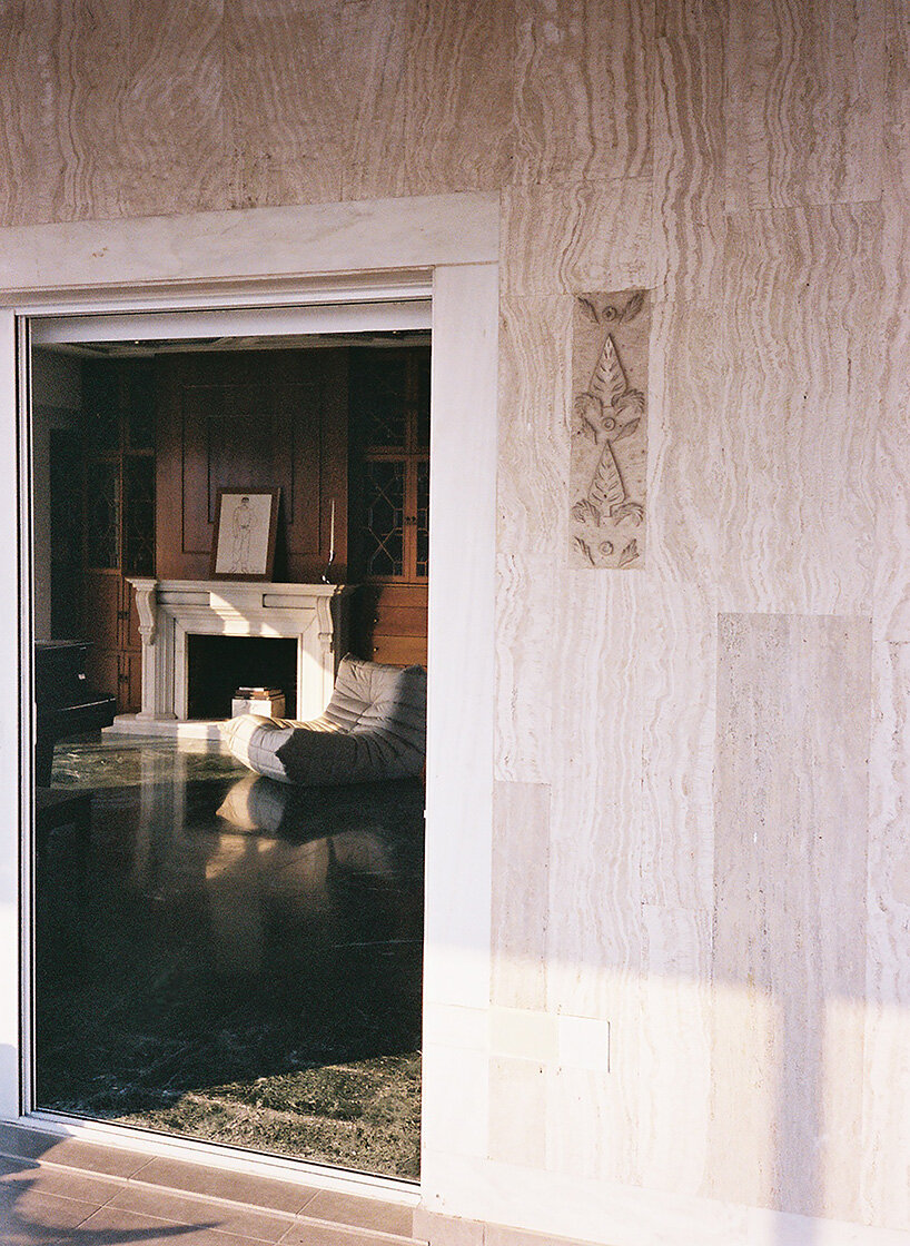 glass blocks and marble surfaces illuminate the renovation of 1960s athens penthouse