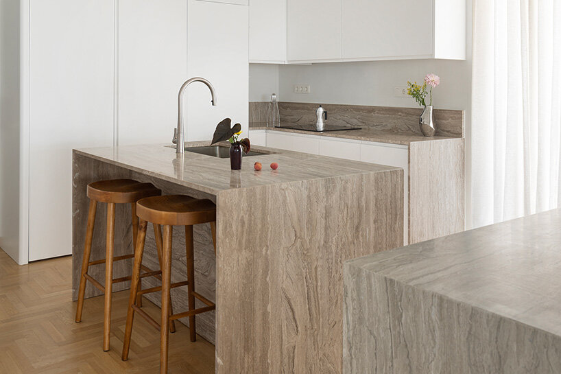 glass blocks and marble surfaces illuminate the renovation of 1960s athens penthouse